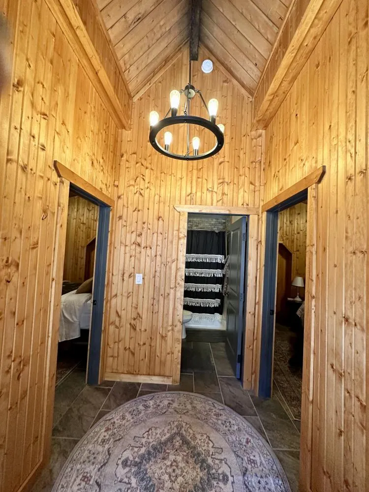 Top story landing area- doors lead to bedrooms & bathroom. 