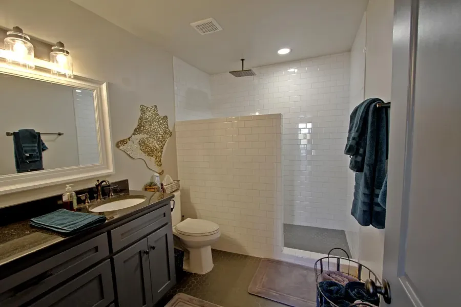 The large bathroom has a tile shower & on the main level. 