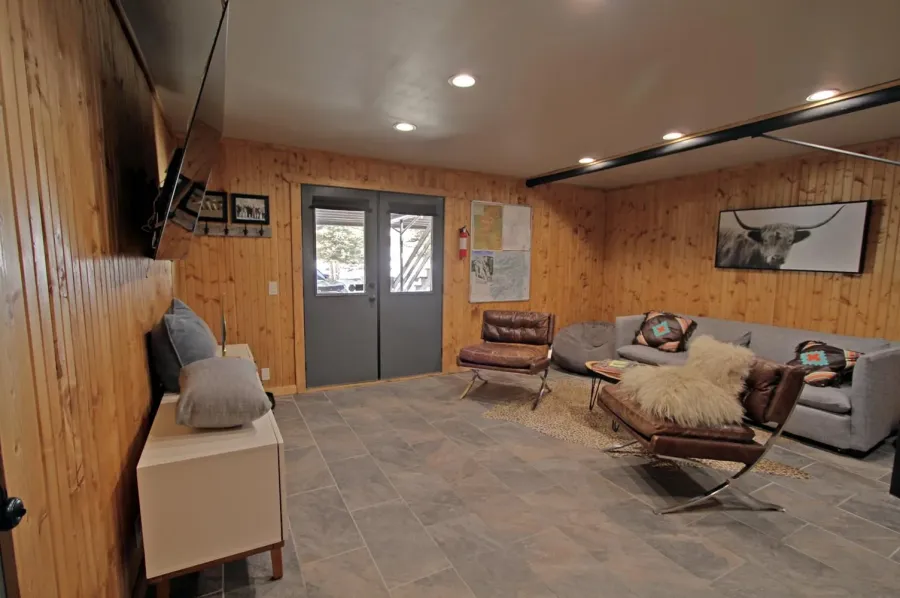Queen sized memory foam sleeper sofa & large TV in basement 