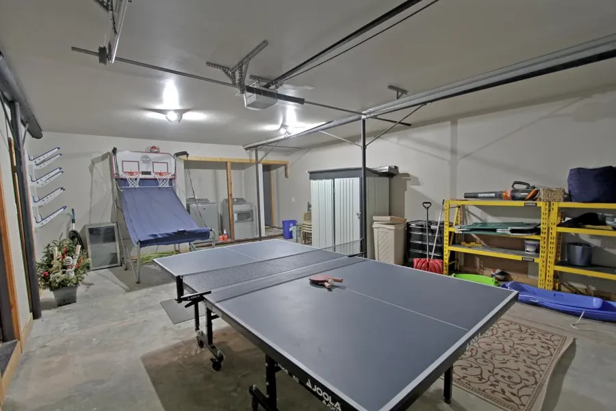 Garage is locked off & converted to a gameroom / laundry room. 